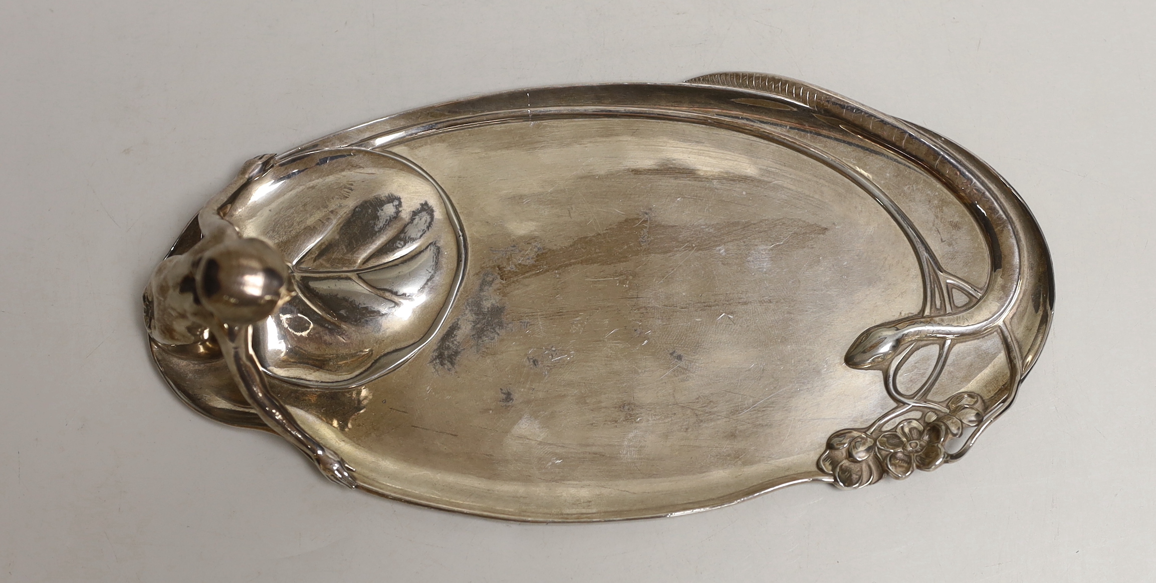 An Art Nouveau WMF (Wurttemburgerische Metallwarenfabrik) polished pewter figural tray, 25cm long